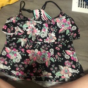 A flower print bathing suit top